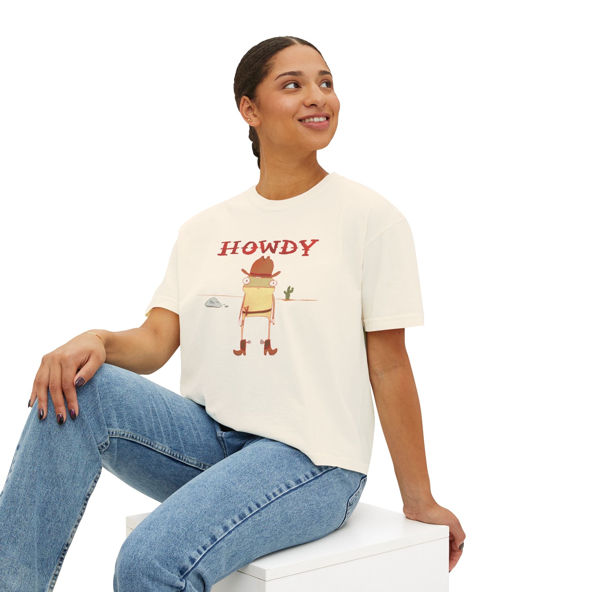 Person wearing a 'HOWDY' t-shirt with a graphic design on a white background