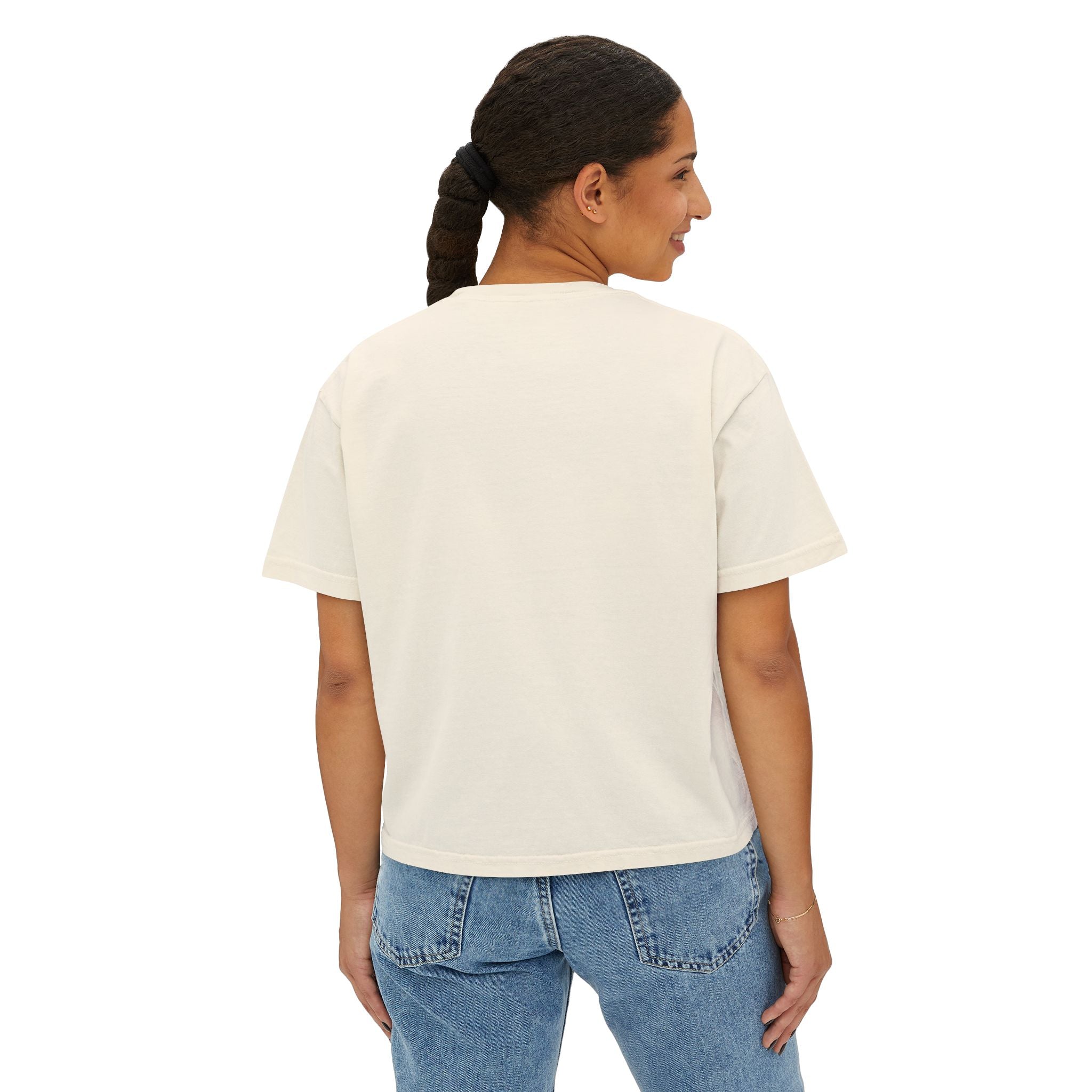Back view of a woman wearing a white t-shirt and blue jeans on a white background