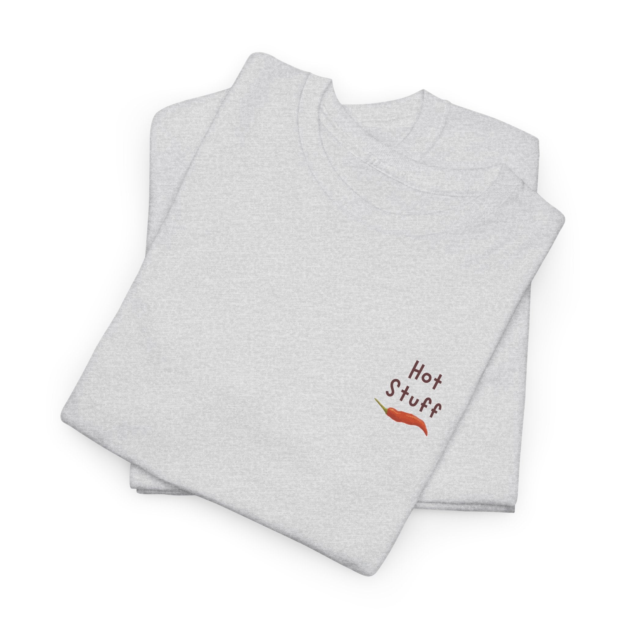 a folded T-shirt showcasing the logo design of a chili pepper and logo that says "hot stuff"