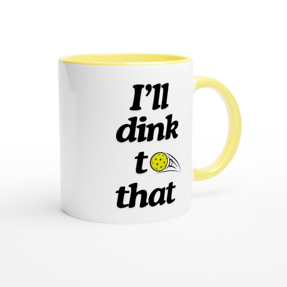 font view of pickle ball mug with yellow ceramic accents and funny pickle ball quote that says "I'll dink to that"