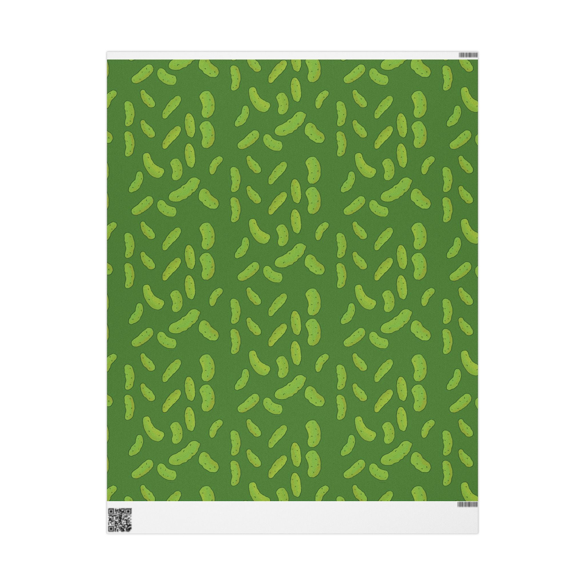 dill pickle wrapping paper that features a pattern of dill pickles over a dark green background is shown unrolled over a white background