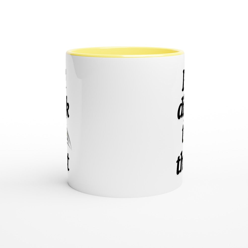 side view of pickle ball mug with yellow ceramic accents and funny pickle ball quote that says "I'll dink to that"
