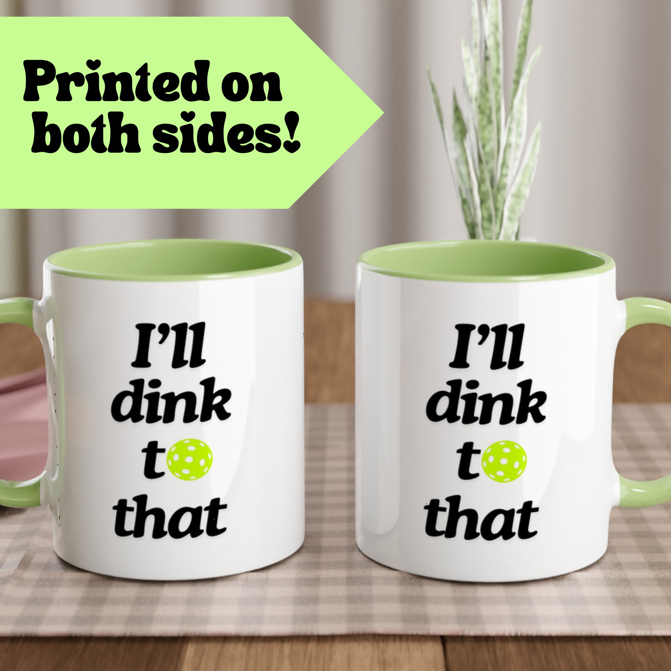 view of a pickle ball mug with a funny quote that says "I'll dink to that" with illustration of green pickle ball