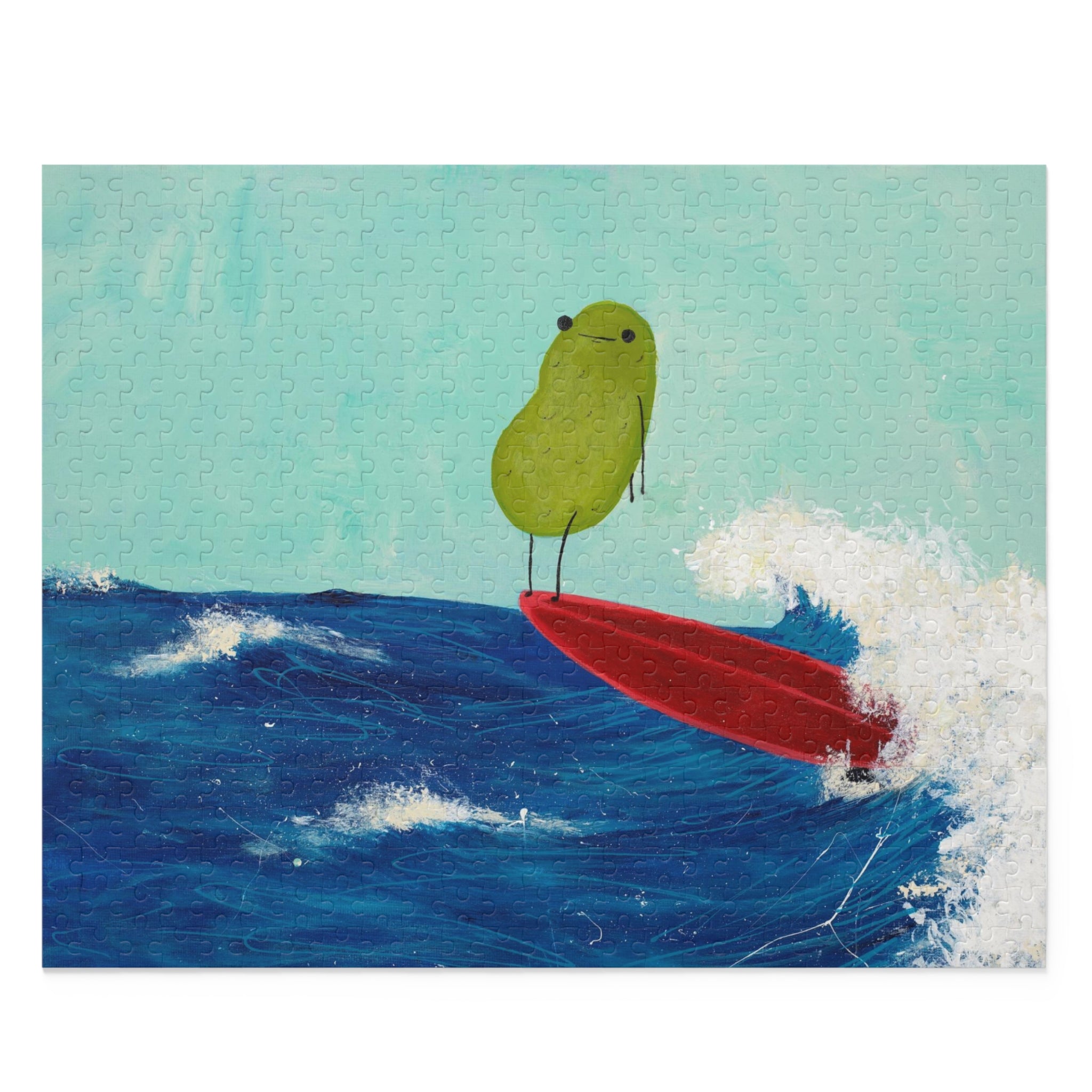 Image of a completed 500 piece jigsaw puzzle image containing a whimsical beach scene of a surfing pickle