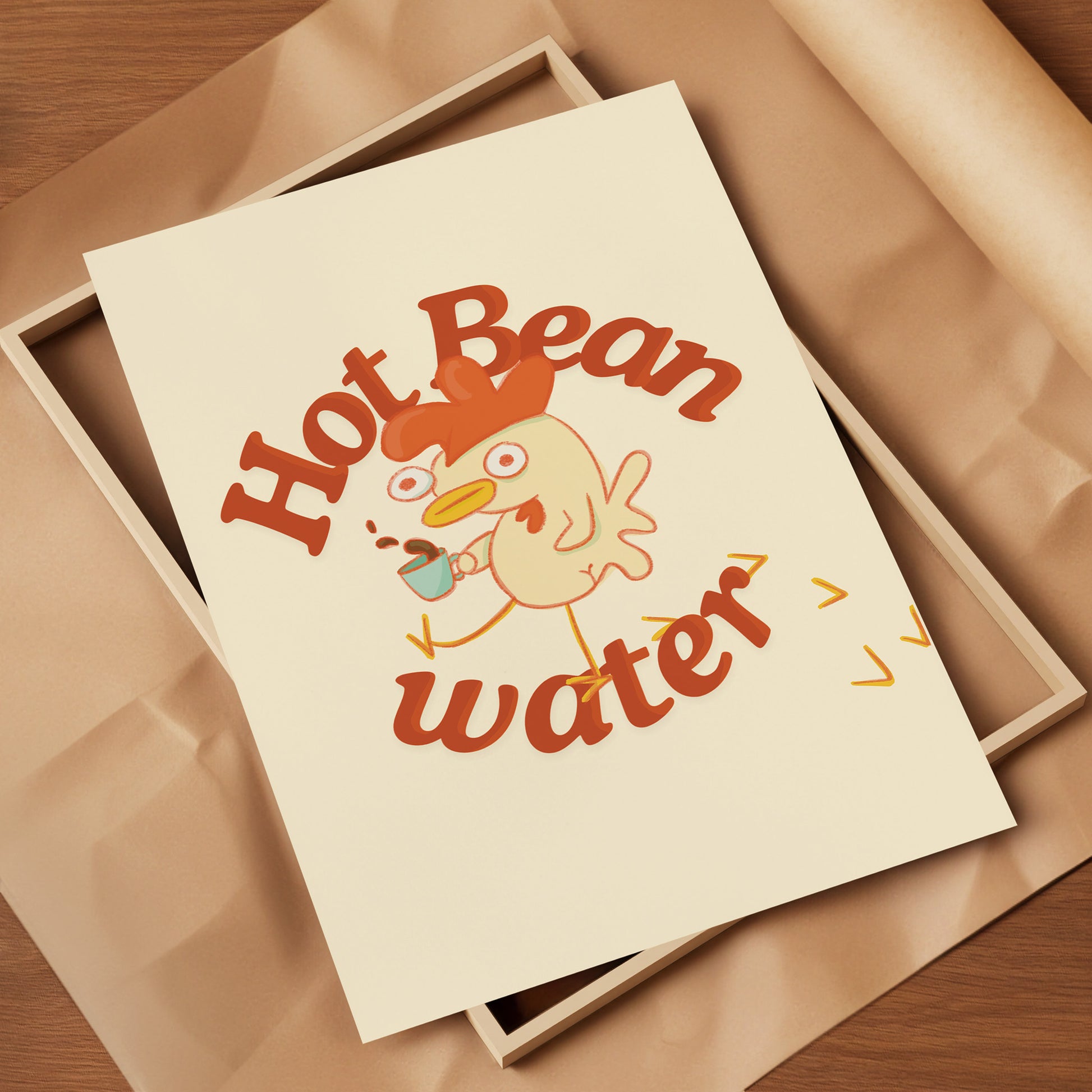 a funny coffee art print that features a chicken holding a cup of coffee next to text that reads &quot;hot bean water&quot; is rested on top of packing material