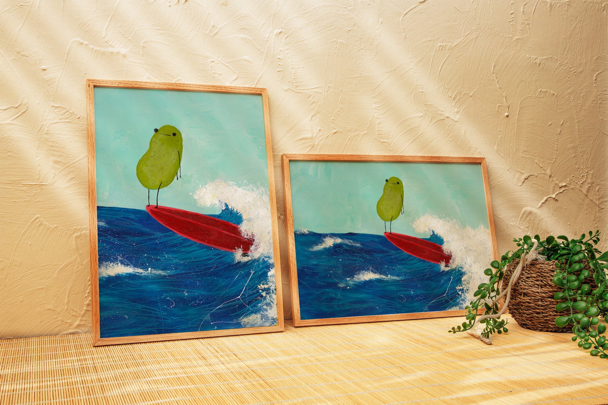 a pickle art print featuring a cute pickle riding a red surfboard on a wave is displayed both horizontally and vertically indicating product options