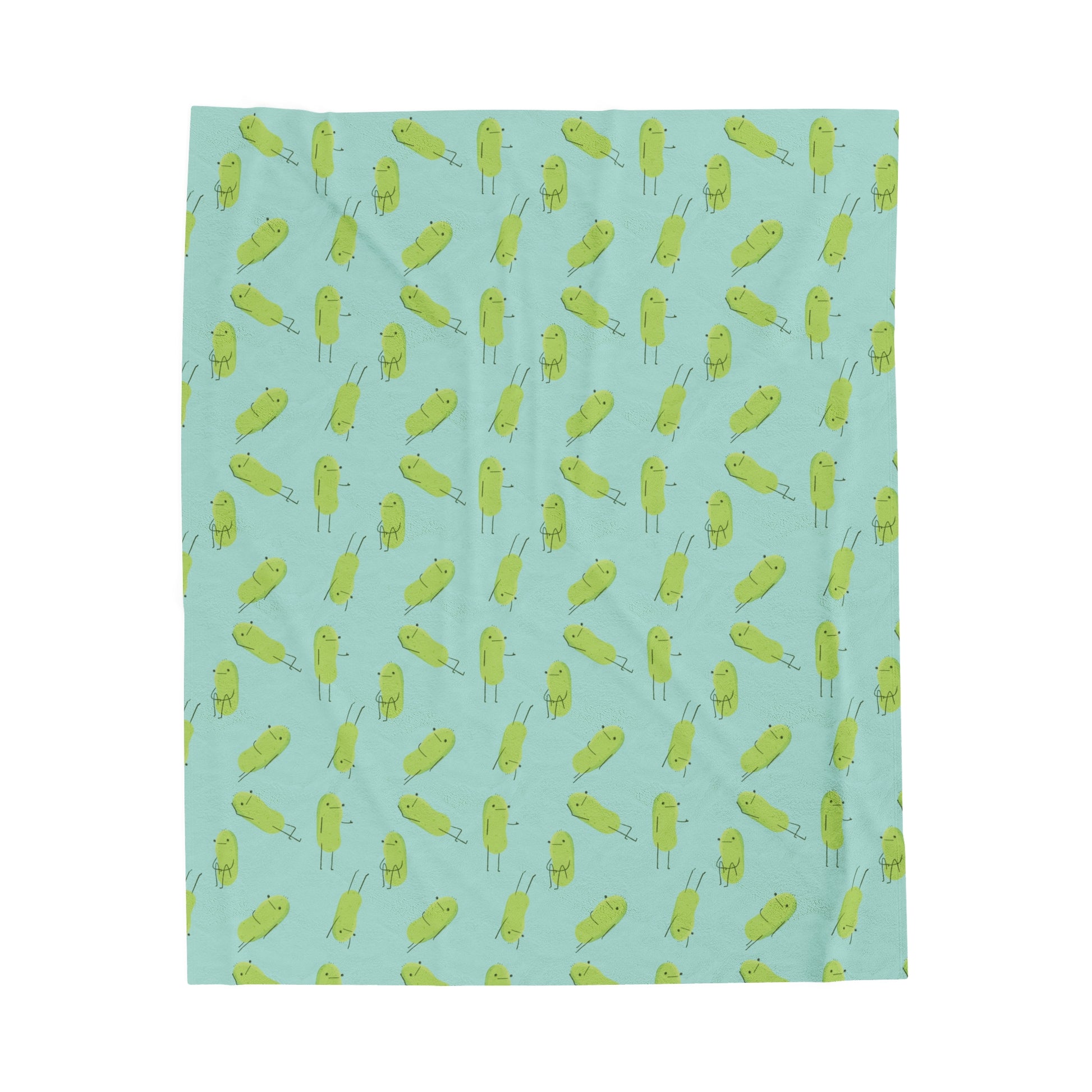 a pickle blanket that is light blue in color and has a print pattern of cute pickle characters in different positions is displayed over a white background