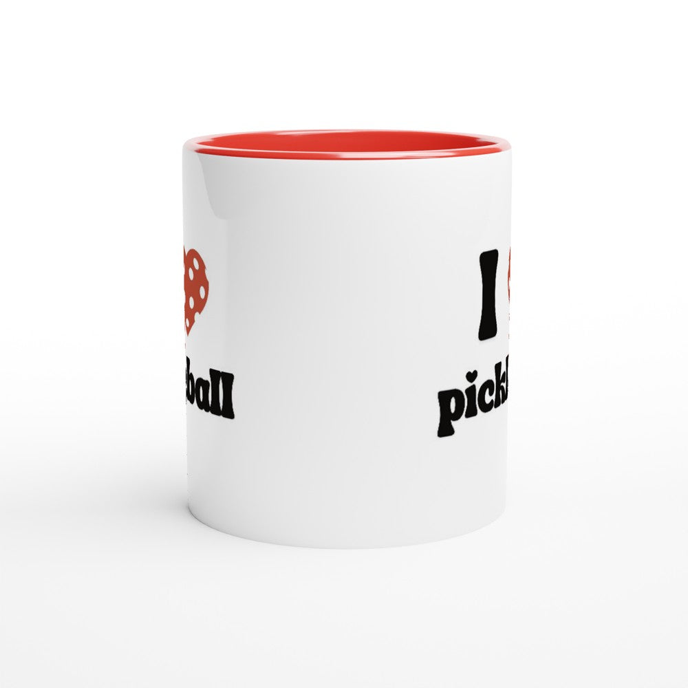 side view of a pickle ball mug with a quote that says "I heart Pickle ball" with red ceramic accents